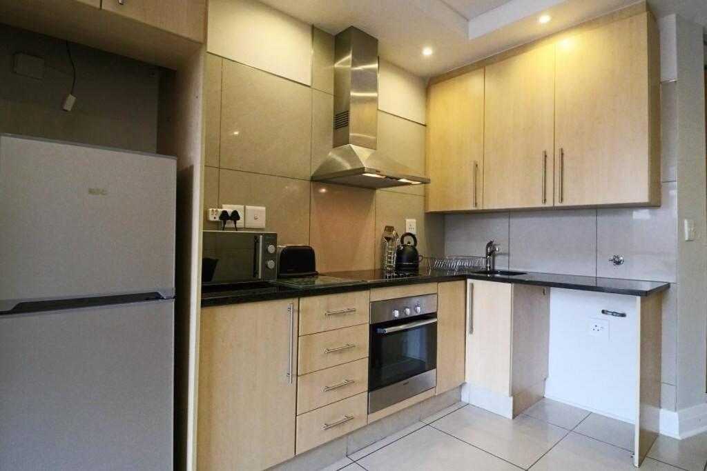 Upmarket Sandton Hydro Park Apartments Johannesburg Bagian luar foto